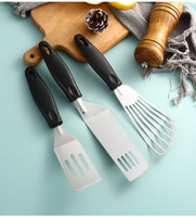 Nouvelle arrivée Spatule à fente en acier inoxydable PP de haute qualité