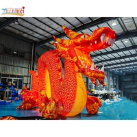 Zhenmei annonçant le dragon chinois gonflable géant pour l'événement