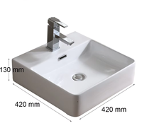 Lavabo de salle de bain moderne en céramique blanche polie avec meuble sous-évier et lavabo artistique intégré au comptoir