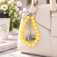 Pendentif Caducée fait main en perles jaunes avec inscription grecque EST 1932 pour la sororité Chi Eta Phi, idéal pour la confection de sacs et de porte-clés