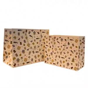 Custom Logo Biodegradable Gift Shopping Garment <b>Bag</b> Paper Paper <b>Bag</b> With Handle Wrapped in White Kraft Paper <b>Bag</b> - Product Image 1