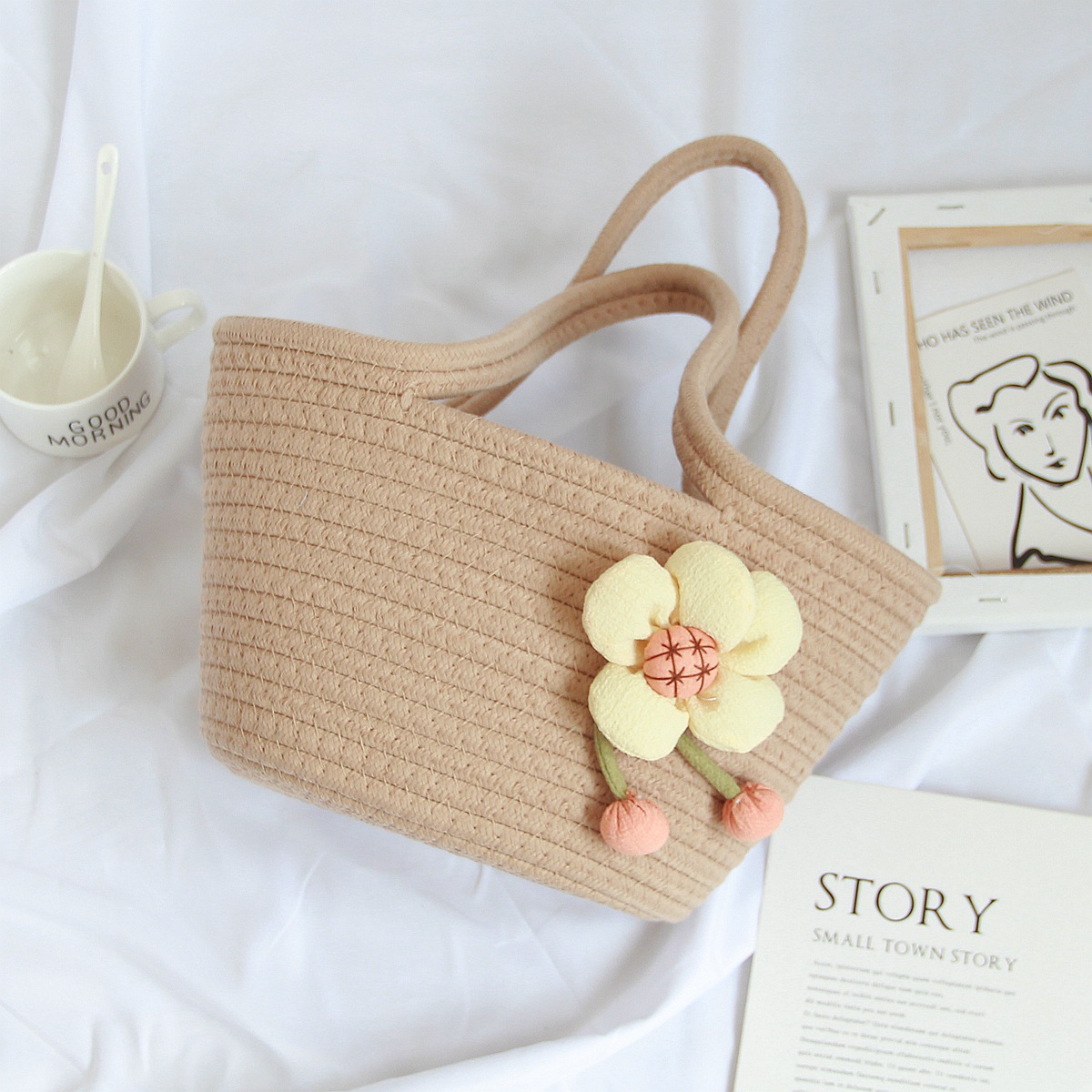 Borsa a mano color kaki con motivo floreale