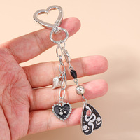 Nouveau porte-clés créatif en alliage de zinc en forme de cœur, pendentif de sac haut de gamme, léger et étanche