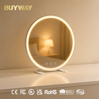 Miroir de maquillage rond blanc avec anneau lumineux à lumière chaude et base à pieds discrets, miroir de vanité LED de table