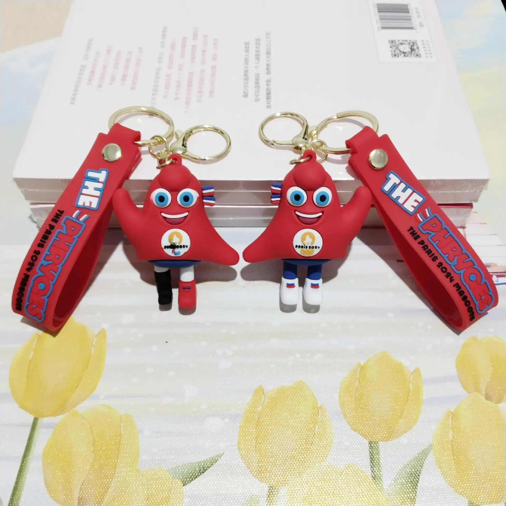 Cross-border 2024 Paris cute mascot key chain bag hanging souvenir gift wholesale Frij hand keychain pendant