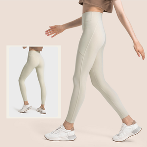 Leggins deportivos sólidos desnudos con logotipo personalizado para mujer, pantalones de Yoga transpirables de cintura alta de secado rápido con bolsillos - Product Image 2