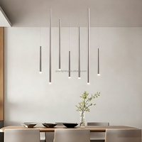 Lustre cylindrique de luxe en acier inoxydable à hauteur variable, luminaire suspendu sur mesure pour hall d'hôtel, escalier, éclairage commercial