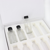 Boîte de tiroir magnétique double couche en carton rigide écologique avec insert en mousse EVA pour emballage de collection de soins de la peau bouteille en verre