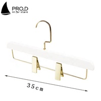 Magasin de vêtements en gros cintre adulte avec Clip en or cintre en bois blanc pour pantalons