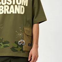 T-shirt pour homme en tricot vert olive à col rond, imprimé graphique camouflage, coupe ample, manches courtes, poche cargo, logo personnalisé, streetwear