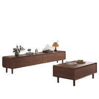 Ensemble de console TV et table basse en bois de noyer bicolore avec tiroirs noirs texturés et design à bords arrondis