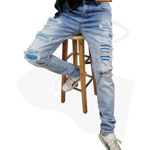 جينز رجالي ضيق مزين بالأحجار الزرقاء الكلاسيكية بمقاسات كبيرة، تصميم بالجملة مطلي ومغسول بالحجر وممزق بطراز الهيب هوب - Product Image 1