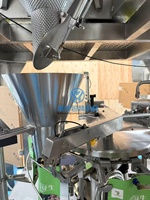 Machine d'emballage automatique rotative pour sachets préformés YH, machine d'emballage sous vide pour pistaches, noix de cajou, arachides, noix