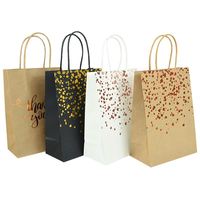 Vente en gros de sacs d'emballage en papier de luxe noirs chaussures vêtements imprimé logo personnalisé vêtement shopping cadeau bijoux emballage sac en papier