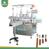 Machine de remplissage automatique électrique de haute précision pour petites fioles en verre, contrôle PLC, pour produits chimiques, parfums, vernis à ongles, garantie 1 an