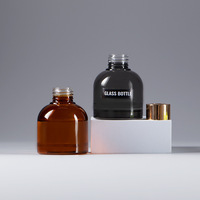 Flacon diffuseur à roseaux en verre ambré gris personnalisable de 100 ml avec bouchon doré/noir sérigraphié pour emballage cosmétique et parfum d'ambiance