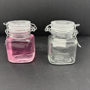 Vente en gros à prix réduit de 100ml Mini bougie carrée Bocal en verre hermétique avec capuchon à clip pivotant - Product Image 1