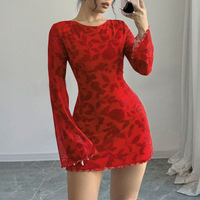 Nouvelle robe courte sexy à imprimé léopard, col rond, manches longues, dos nu à lacets, style streetwear transfrontalier Europe-Amérique pour l'automne