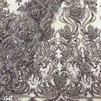 Tissu en dentelle brodée à bord festonné en maille, orné de perles lourdes, de paillettes mauves et de strass, motif vigne enroulée, pour robe africaine Dubai Aso Ebi