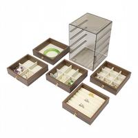 Boîte de rangement à bijoux 5 couches en gros avec couvercle anti-poussière transparent, tiroirs imitation bois et compartiments de rangement doublés de velours