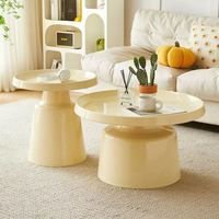 Table basse ronde en fer forgé, design moderne et minimaliste, combinaison de formes champignon en noir et blanc, pour salon