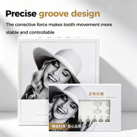 Brackets dentaires pour traitement orthodontique en alliage métallique, conception à fente lisse, emballés en plateau, positionnement numéroté, usage clinique