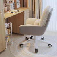 Chaise de bureau ergonomique pivotante en cuir moderne avec accoudoirs fixes et hauteur réglable pour le bureau à domicile et la chambre