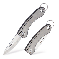 Couteau pliant multifonctionnel miniature avec poignée en alliage de titane portable avec porte-clés Produit OEM disponible pour la sélection