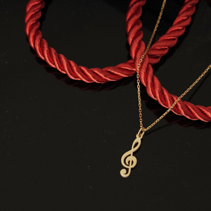 Collier élégant avec pendentif clé de sol en acier inoxydable plaqué or, bijou minimaliste en forme de note de musique pour femme, cadeau pour les amoureux de la musique - Product Image 1