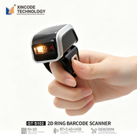 Escáner lector de código Qr 2D portátil Xincode Mini CMOS diente azul anillo de dedo portátil escáner de código de barras pequeño inalámbrico