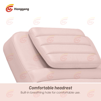 Lit de cils électriques ergonomiques en mousse à mémoire de forme rose incurvé pour salon de beauté pliable à hauteur réglable de luxe