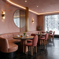Ensemble de mobilier moderne pour café, restaurant, hôtel, cafétéria : banquette en cuir orange clair, chaise en tissu à pois, table en bois
