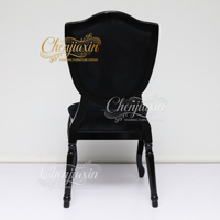 Chaise de salle à manger moderne gothique noire en gros, dossier bouclier à boutons en cristal, chaise de mariage de luxe en velours de style français pour hôtel et fête