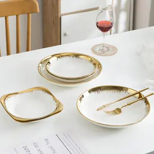 Hochwertiges weißes Geschirr-Set Porzellan Luxuskeramik-Geschirr Hotel runde vergoldete Teller Restaurant