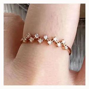 Bijoux fins Xinfly, bague ondulée en or pur 18 carats de haute qualité avec diamant naturel de 0,09 ct - Product Image 1