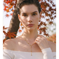 Collier JINYOU 8079 en acier inoxydable plaqué or PVD, délicat, avec chaîne en Y et pendentif en zircon cubique ondulé, pour bijoux élégants