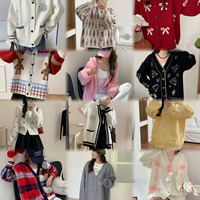 Femmes brodé Floral tricot Cardigan pull tissé à la main épais laine col en v à manches longues bouffantes en gros hiver Cardigan pull