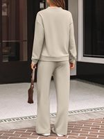 Ensemble de survêtement deux pièces personnalisé OEM pour femme : hauts à col roulé simulé et pantalon large à cordon de serrage avec poches
