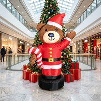 Ours de Noël gonflable agitant la patte avec combinaison rouge et canne en sucre pour la décoration extérieure de jardin et de magasin, accessoire d'ambiance festive