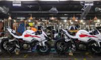 Ligne d'assemblage de motos semi-automatique avec convoyeur à chaîne à lattes 50 unités/heure