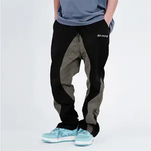 Hochwertige Hose 100 % Nylon Strick Herren elastische Taille High Street Vibe Hosen gerader Hosen mit Patch Streifen-Design