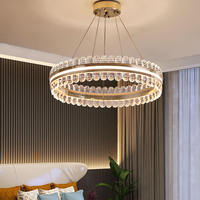 Lustre de salon de luxe doré, design post-moderne minimaliste, éclairage en cristal haut de gamme élégant pour villa et chambre à coucher
