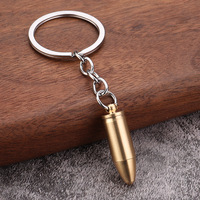 Vente en gros usine Cure-oreille portable en laiton couleur laiton, modèle en forme de balle, porte-clés, tendance nationale
