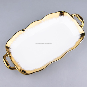 Bol en céramique de luxe à bord doré avec poignée Plats de cuisson irréguliers Vaisselle décorative <span class=keywords><strong>Plaque</strong></span> de cuisson pour hôtel restaurant - Product Image 1