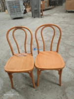 Chaise à dossier croisé en PP imitation bois OK-PP1106 pour hôtels, mariages, événements et sièges commerciaux