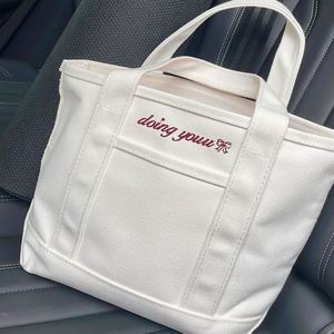 ถุงช้อปปิ้งผ้าแคนวาสแบบมีสายสะพายไหล่ สีพื้นเรียบๆ  ขนาด OEM พิมพ์โลโก้ตามสั่ง เป็นมิตรกับสิ่งแวดล้อม รีไซเคิล ใช้ซ้ำได้ - Product Image 4