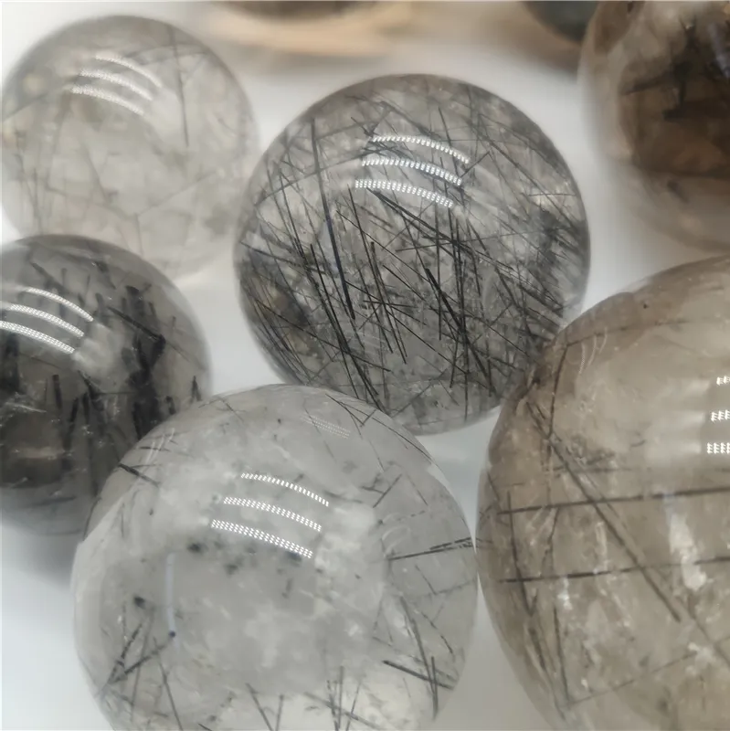 Großhandel schwarze natürliche Tourmaline-Quartz-Kristallkugeln rotilierte Kristallkugeln Kugeln