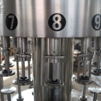 Machine de remplissage automatique rotative à pression négative facile à utiliser, 12, 18, 24, 36 têtes, pour vin, vodka, whisky, rhum, boissons, jus