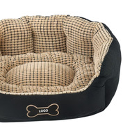 Lit pour chien ovale moderne respirant sur mesure en gros, canapé-lit en fausse fourrure noire, lit pour chat portable antidérapant en fibre de polyester écologique