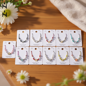 Bracciale in Acciaio Inossidabile con Perle e Cristalli PULSERA Set di Gioielli alla Moda con Perline 12 Pezzi Charm Colorati Fatti a Mano per Donne - Product Image 3